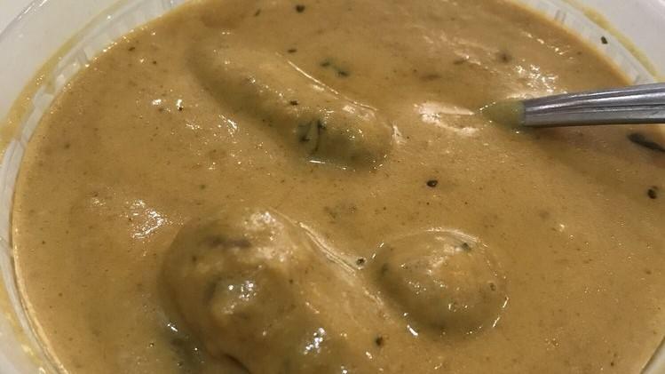 Malai Kofta · Mixed veggie dumplings in creamy sauce or curry served with rice.