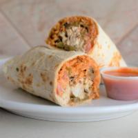 Rj'S Burrito · Flour tortilla filled with your choice of meat, guacamole, rice, beans, lettuce and tomatoes.