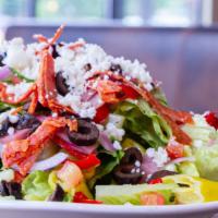 Italiano · Romaine, tomato, red onion, pepperoncini, cucumber, peppadew peppers, black olives, imported...