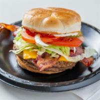 Bacon Double Cheeseburger · Two seasoned quarter-pound patties (half pound), two strips of double-smoked bacon, two slic...
