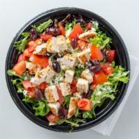Tasso'S Greek Salad · Arcadian mix and iceberg lettuce mixed with feta cheese and our homemade Greek salad dressin...