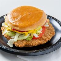 Pork Tenderloin Sandwich With Cheese · Breaded and fried tenderloin on a toasted bun topped with American cheese, ketchup, mustard,...