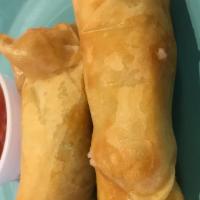 Spring Rolls (2 Pc) · vegan/vegetarian spring rolls, hand made in store and cooked in vegan only fryer, cabbage, c...