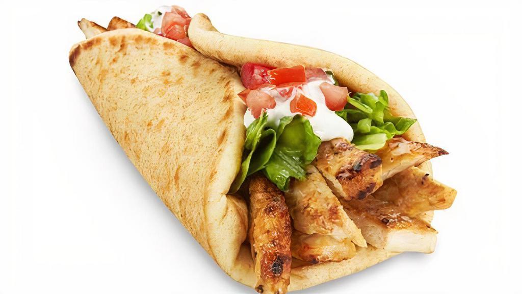 Flame-Grilled Chicken Pita!  · Sliced Char-Broiled Chicken Breast  Mayo  Lettuce  Tomatoes!.