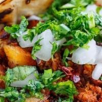 Chorizo Con Papas Taco - Single · Mildly-spiced pork chorizo mixed with potato, Chihuahua cheese, diced onion, and a pinch of ...
