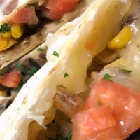 Tex Mex Quesadilla · Pico de Gallo (salsa of fresh jalapeños, onion, and tomato), corn,. and frijoles negros (bla...