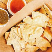 Chips & Salsa · Fresh salsa verde and salsa roja, made in-house daily, with our. housemade tortilla chips.