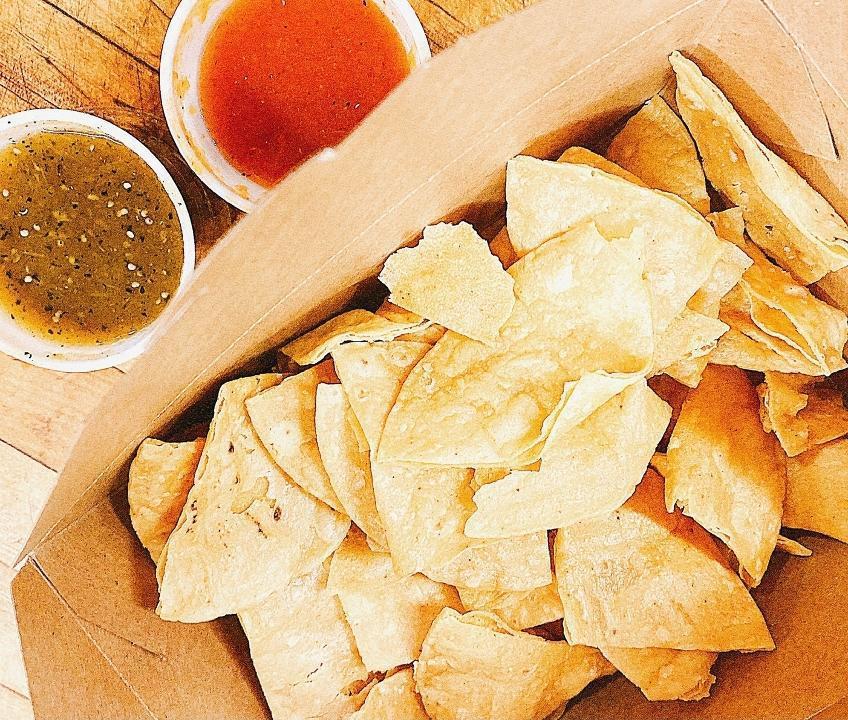 Chips & Salsa · Fresh salsa verde and salsa roja, made in-house daily, with our. housemade tortilla chips.