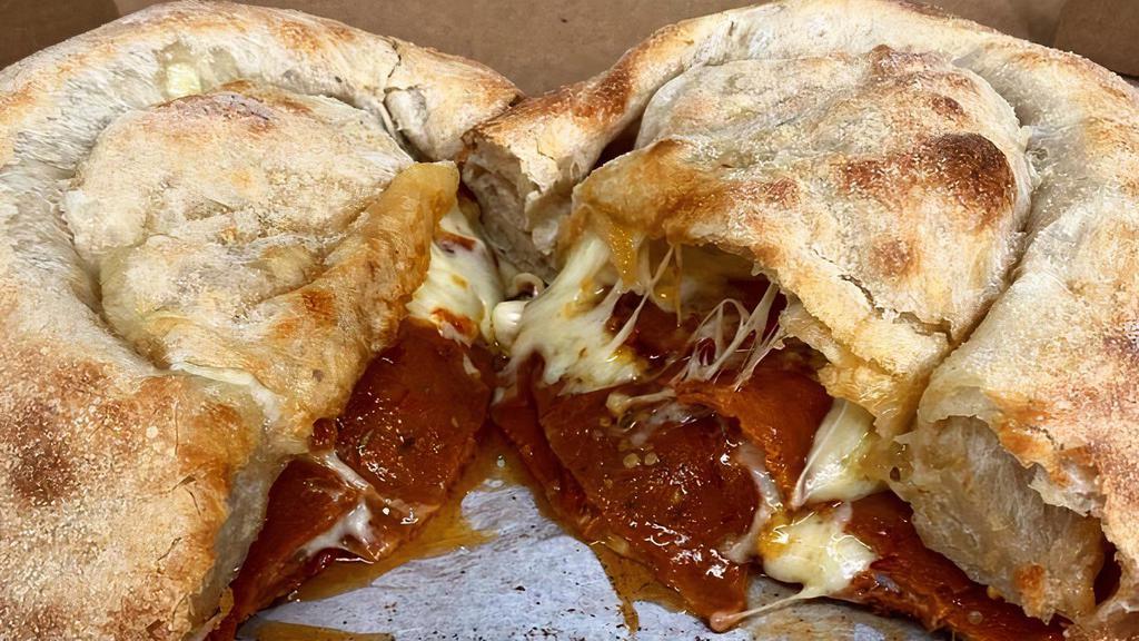 Pepperoni Calzone - Dd · Plant-based pepperoni, cheese, and our delicious fermented dough made into an awesome calzone. - Serves 2