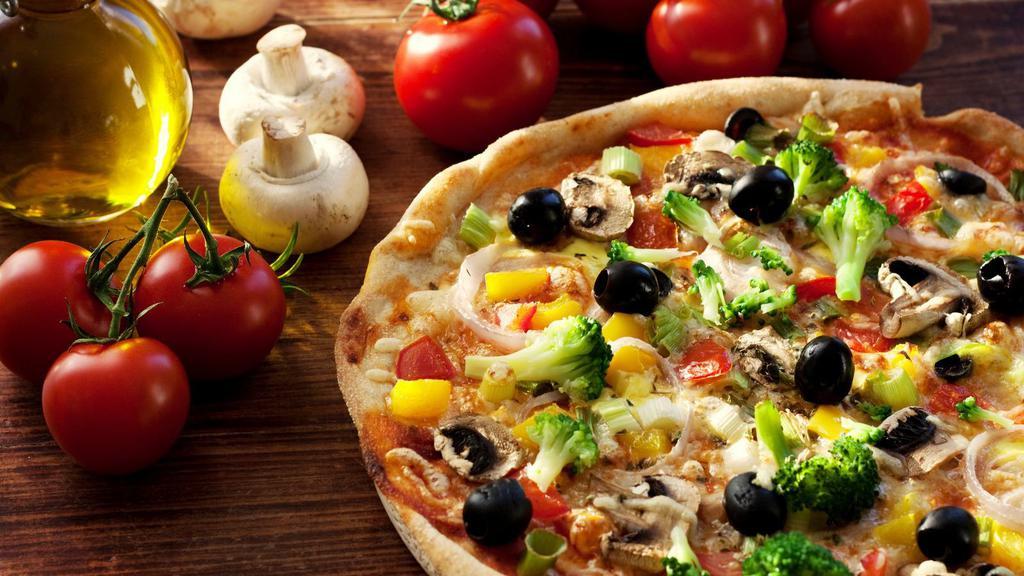 Veggie Lover'S Pizza · Delicious Pizza topped with Mushrooms, olives, onions, green peppers, tomatoes and extra cheese.