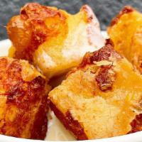 Cheese Curds · Order a side of cheese curds (8)! They're beer battered white cheddar cubes of deliciousness!