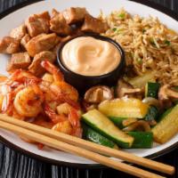 Hibachi Chicken & Shrimp · Delicious Chicken and Shrimp dish prepared Hibachi-style. Served with fried rice, cabbage, a...
