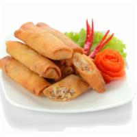 Chicken Spring Roll · Fried rice paper filled with Chicken and mixed veggies.