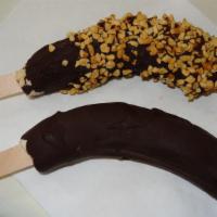Chocolate Covered Frozen Banana With Nuts · 