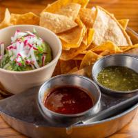 Chips & Guacamole · housemade tortilla chips with salsa chipotle, salsa verde and guacamole.