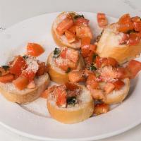 Bruschetta · Toasted Italian bread topped with diced tomatoes and fresh basil.