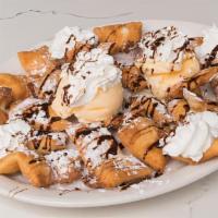 Fried Dough · Includes vanilla ice cream, chocolate sauce, and whipped cream. Available for buffet service...