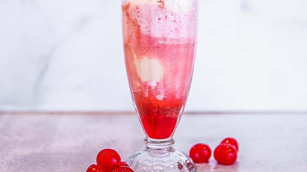 Ice Cream Soda · Vanilla ice cream and your choice of chocolate, strawberry, pineapple, maple, or cherry mixed with bubbling soda, topped with whipped cream and a cherry.