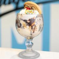 Cookie Monster Jr La La · Two scoops each of Cookie Dough and Cookies 'N Cream ice cream topped with hot fudge, cookie...
