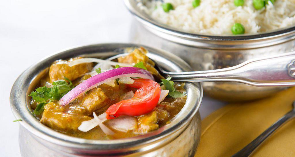 Lamb Curry · Lamb prepared with special sauce from fresh onions, garlic, and spices.