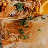 Chorizo Burrito · Housemade chorizo, hashbrown patties, beans, corn, chipotle sauce, pico de gallo, diced pepp...