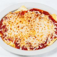 Beef Ravioli · Large ravioli stuffed with beef braised in a Chianti reduction, blended with Asiago and Parm...