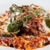 Meatball Dip · Three meatballs served over mostaccioli with roasted peppers, classic tomato sauce, and bake...