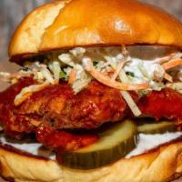 Buffalo Chicken Sandwich · Hand-breaded fried chicken tossed in our house-made buffalo sauce, topped with bleu cheese d...