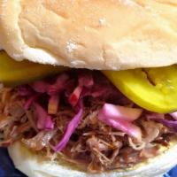 Braised Pork Sandwich · Coleman's organic pork marinated in rum, bananas and Cuban spices, braised for 12 hours, red...