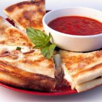 Pizza-Dias · It's a new thing - sorta like quesadillas but made with super thin pizza dough wit' some che...