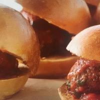 Meatball Sliders · 4 sliders with banana peppers and served with Parmesan fries.
