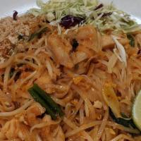 Pad Thai · Thai thin rice noodles with egg, bean sprouts, onions, tofu, crushed peanuts, stir-fried wit...