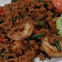 Basil Fried Rice · Medium spicy. Sweet basil leaves, hot peppers, green beans and stir-fried with rice in our h...