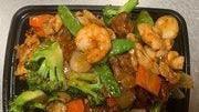 Triple Delight With Hunan Style · Spicy. Chicken, beef and shrimp with mushrooms, snow peas, broccoli, water chestnut and baby...