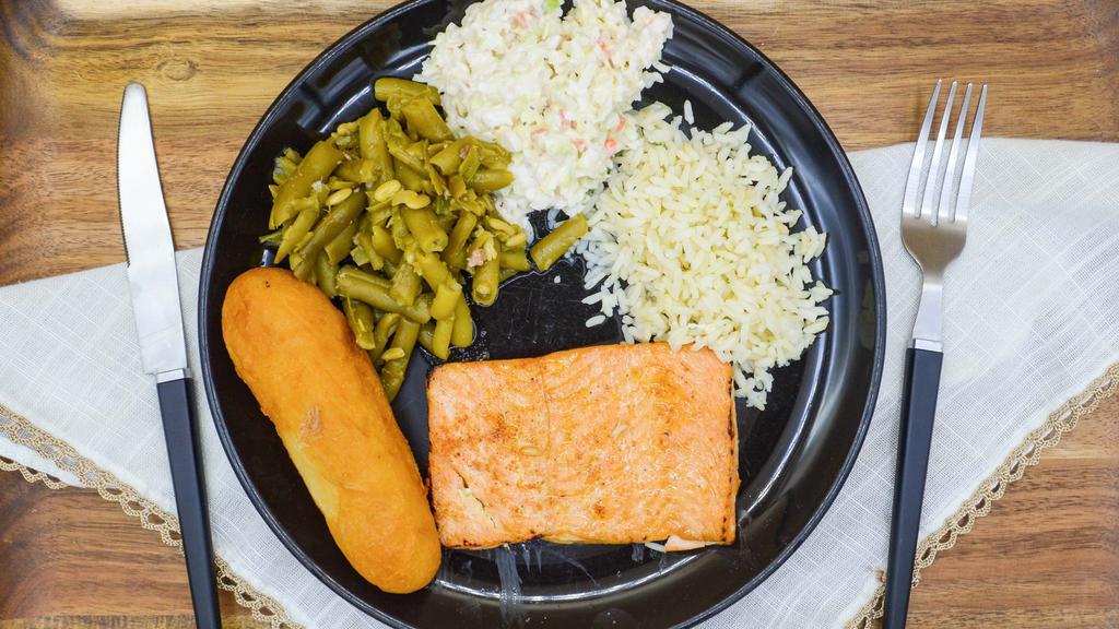 Wild Alaskan Salmon · Wild Alaskan Salmon seared to perfection and served on a bed of rice with your choice of two sides and a breadstick.