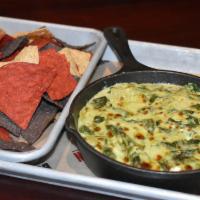 Spinach Artichoke Dip · Hand-crafted 3 cheese blend with fresh spinach & artichokes, served with tri-color tortilla ...