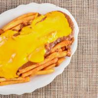 Chili Cheese Fries · Seasoned fries with chili and melted squeeze cheese