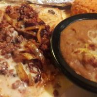 Chory Pollo · A juicy chicken breast grilled with Mexican sausage (chorizo) and onions. Topped with cheese...