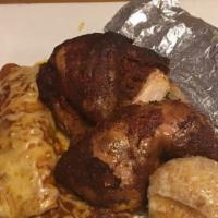 Pollo Asado · Delicious chicken roasted on an open ﬁre. Served with a chicken enchilada, house salad and a...