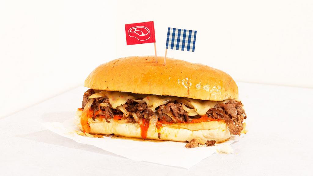 Buffalo Cheesesteak · Steak sandwich with buffalo sauce, grilled onions, and your choice of cheese.