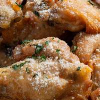 Garlic Parmesan Wings  · Savory garlic, buttery parmesan. A dry rub that is simple and delicious. 

7 Piece Wing Dings.