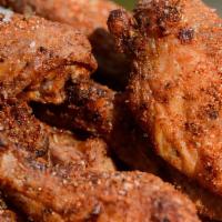 Cajun Wings  · Tossed in  tasty dry seasoning 7 piece Wing Dings