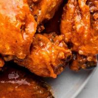 Hot Wings  · Tossed in a housemade spicy sauce. 
Original. 
7 Piece Wing Dings