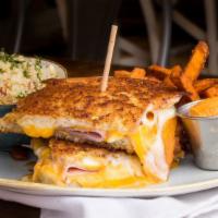Grilled Cheese · wisconsin cheddar, tomato chutney, parmesan crusted sourdoughadd ham & tomato $3