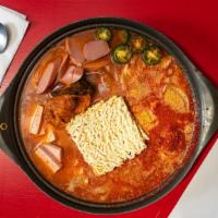 Budae Jjigae · Spicy korean army base soup with ramen, hot dogs, spam, & tofu.