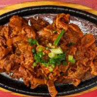 Dwaeji Bulgogi · Spicy marinated pork.