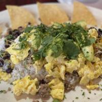 Mayan Eggs · A bed of rice and whole black beans topped with two eggs (sunny side up or scrambled) with c...