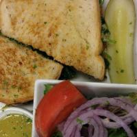 Gourmet Grilled Cheese · Choose from sourdough or wheat bread; served with kettle chips or house salad.