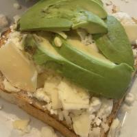 Avocado Toast · Sliced avocado, toasted local bread with goat cheese and shaved parmesan.