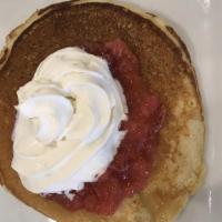 Lemon Ricotta Pancakes · Light and fluffy, house made lemon curd and ricotta cheese, with strawberries on top and ser...